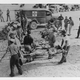Indianapolis' survivors en route to a hospital following their rescue, circa early August 1945.
